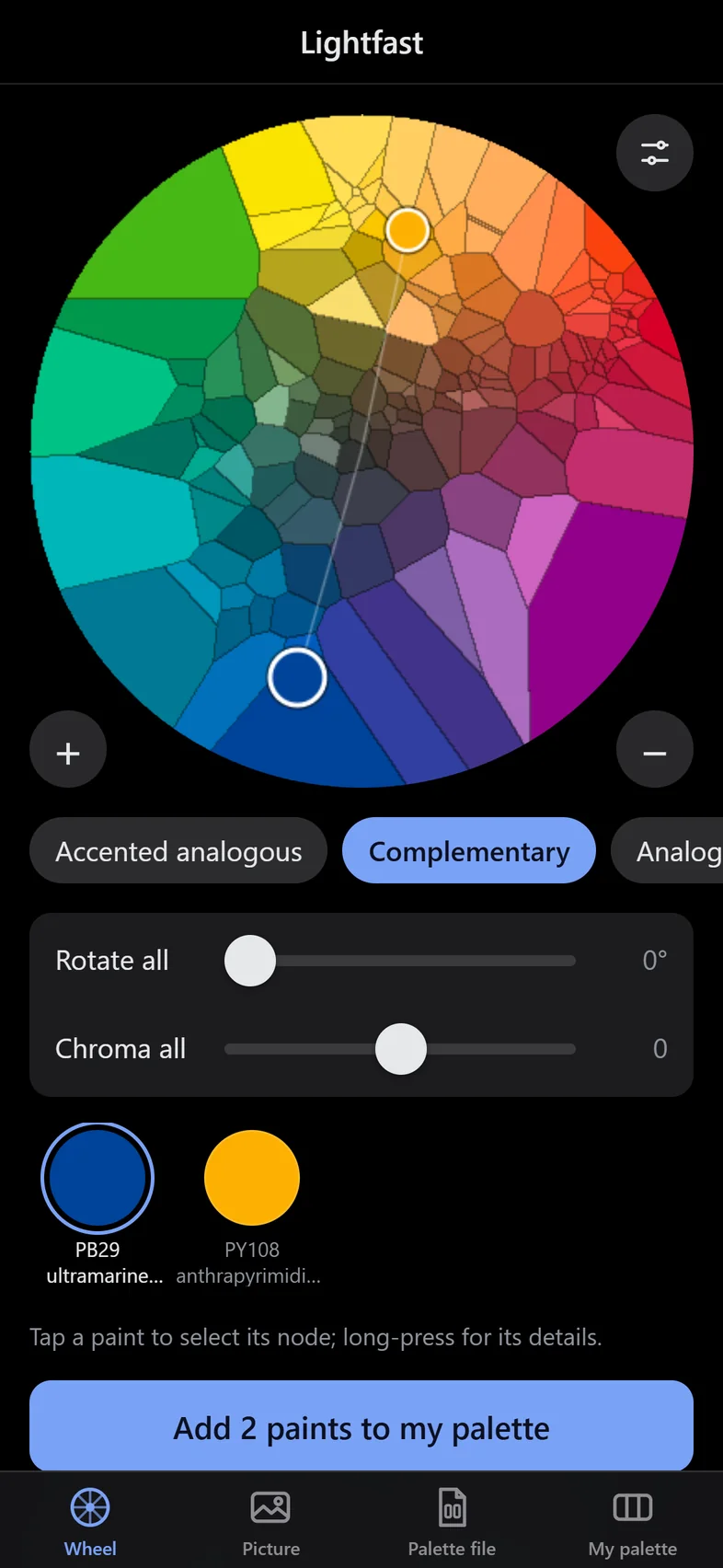 The Lightfast color wheel: every cell is a real, measured watercolor paint, with two paints selected.